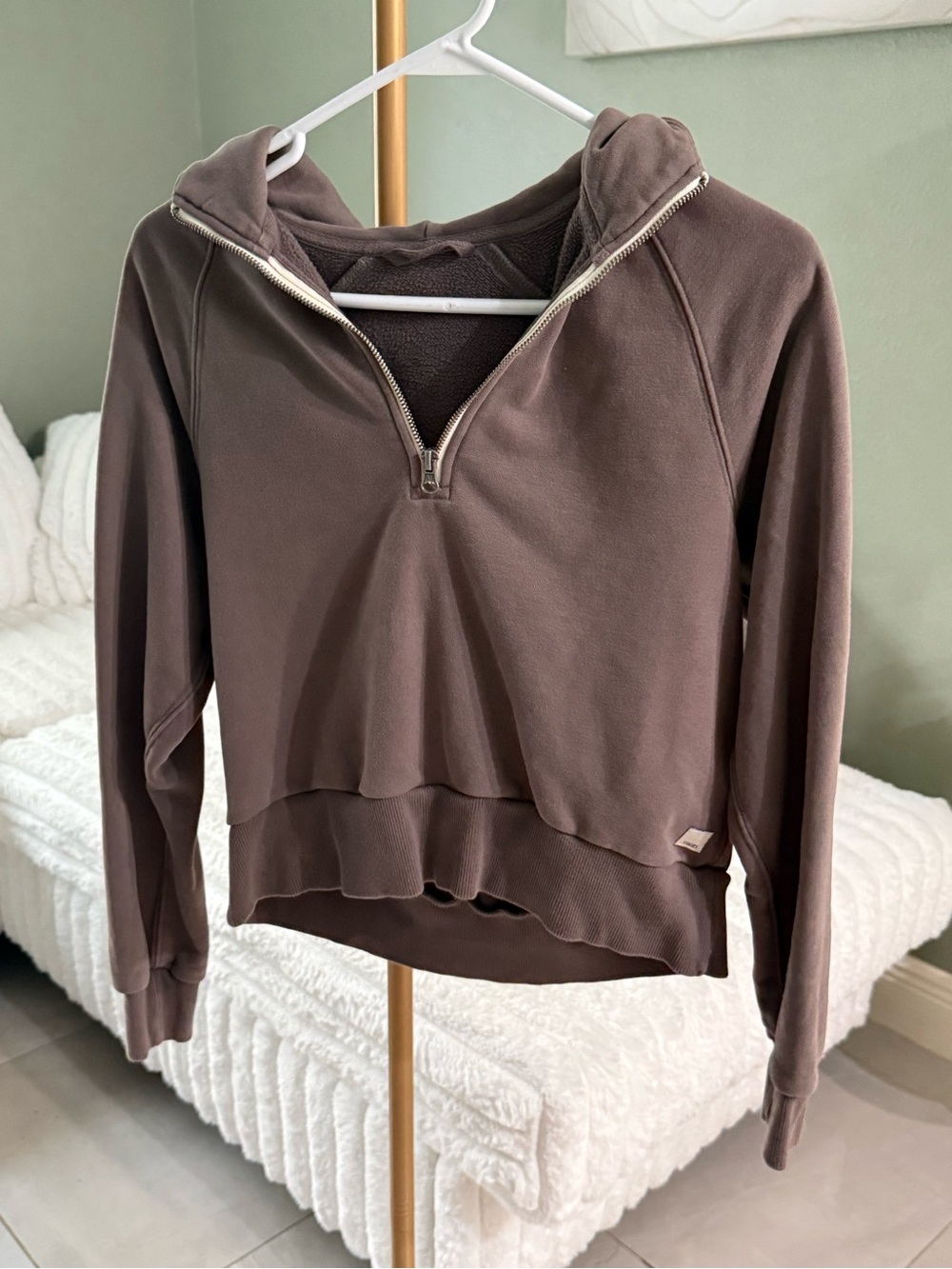 Vuori women's half-zip hoodie in a taupe/brown color, size XS